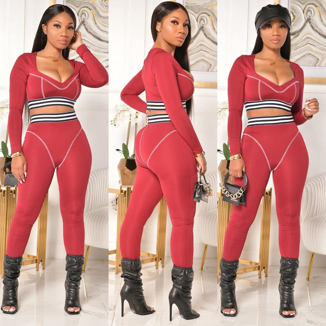 Conjunto deportivo de dos piezas con top y pantalón de manga larga